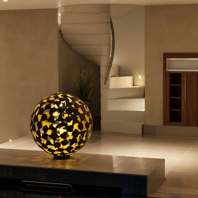 A David Harber sculpture forms a perfect focal point for a private spa lighting design