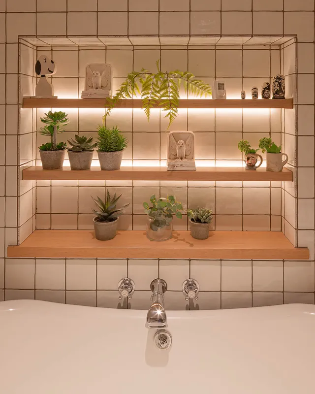 Linear LED lights fun shelving in a family bathroom