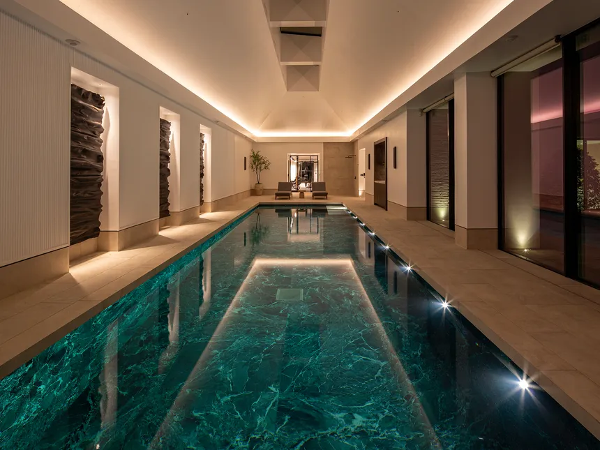 Swimming pool lit with coffer lighting