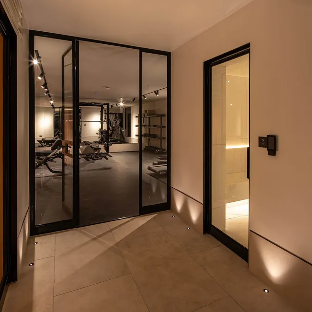 Lighting for the gym and the steam room in a luxury residential spa