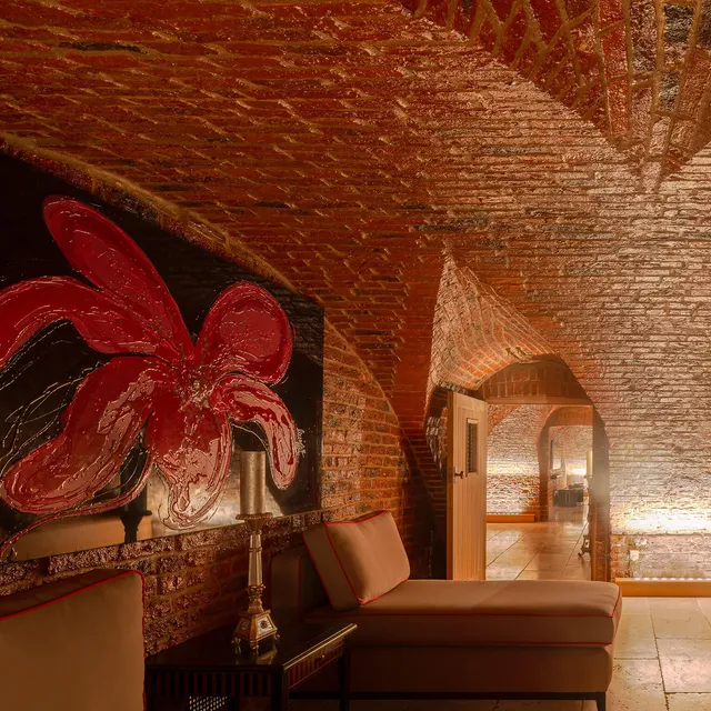 A spa space in a complex of arched red brick cellars