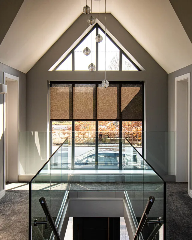 Lutron automated blinds in a modern new-build house on a biright afternoon