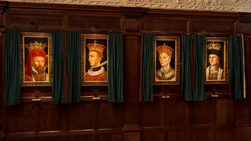 Portraits of the Tudors at Hever Castle showing the curtains traditionally used to protect the paintings from the impact of light