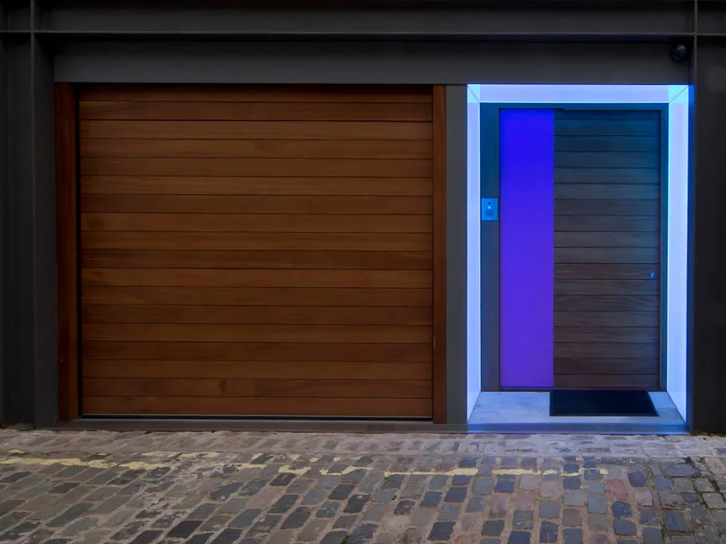 A London mews front door with colour changing LED Lightsheet - ice