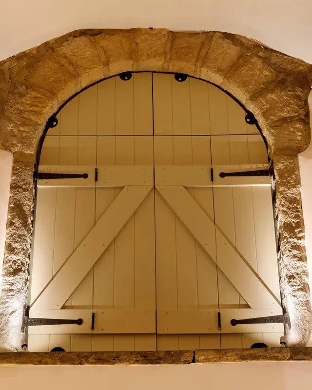 Miniature display fittings lighting a key feature in a Yorkshire stone barn