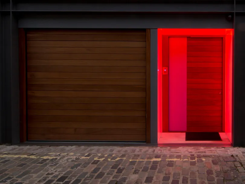 A London mews front door with colour changing LED Lightsheet - Sunset