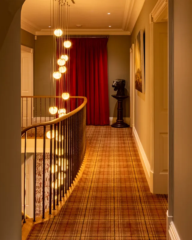 Landing with drop pendant over the stairwell 