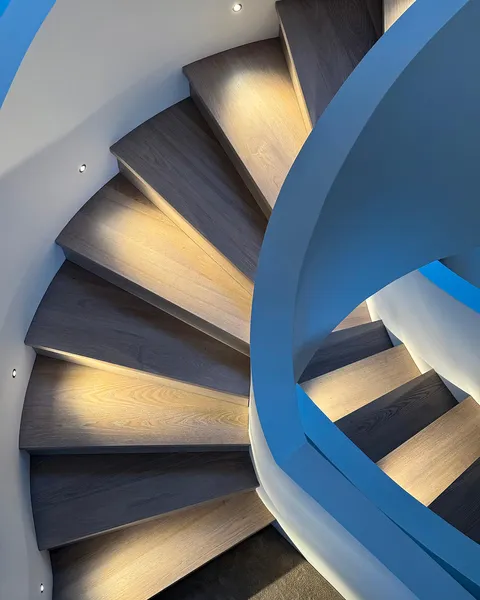 Helical staircase with subtle accent lighting from LD42 LED fittings