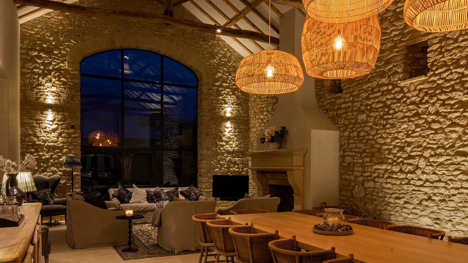 The Entertainment Hall in a converted Yorkshire barn with light washing the stone walls