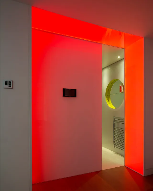 Light-changing LED lightsheet entrance to a sauna - orange