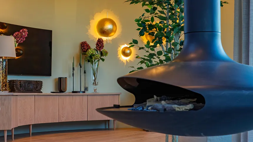 Decorative wall lights in a snug living room in a luxury country house