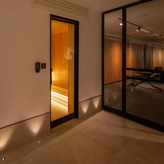 Lighting for the sauna and the gym in a luxury residential spa