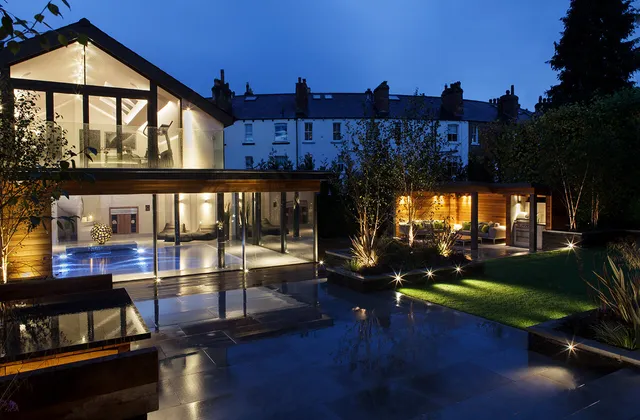 Exterior garden shot looking back towards to pool & gym