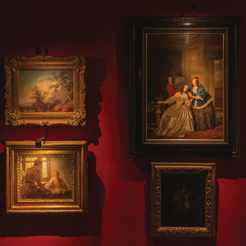 Oil painting illuminated by discreet specialist artwork lighting in a private collection