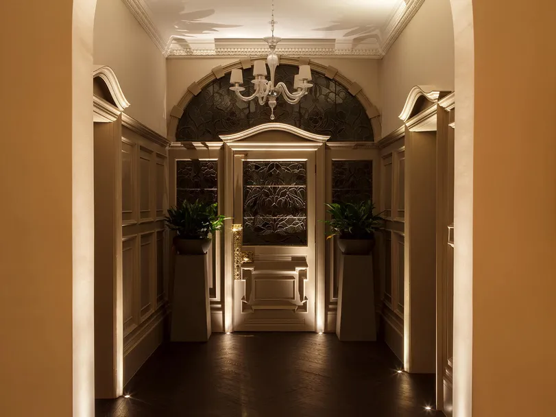 An Edwardian entrance porch and hallway with accent lighting and classic contemporary pendant, porch light and pendant off