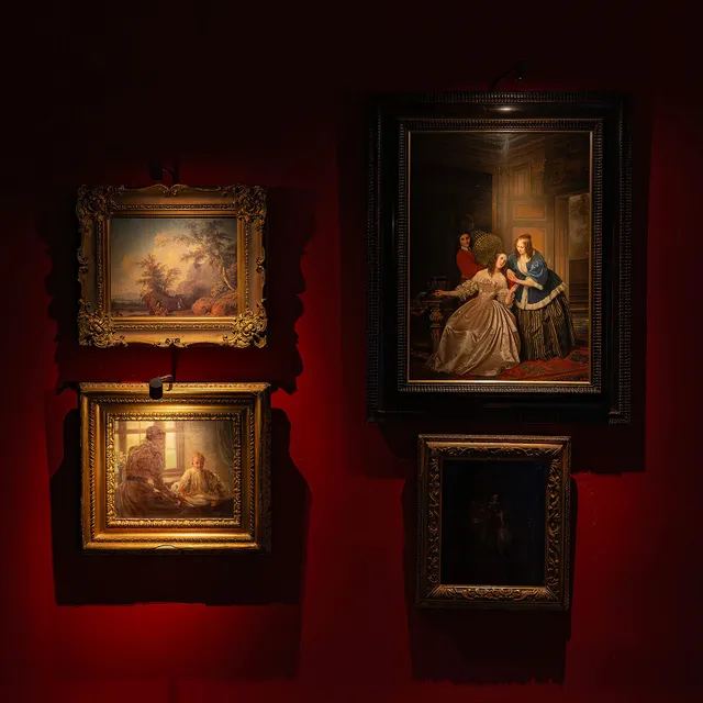 A collection of smaller oil paintings lit with LD82 single head picture lights