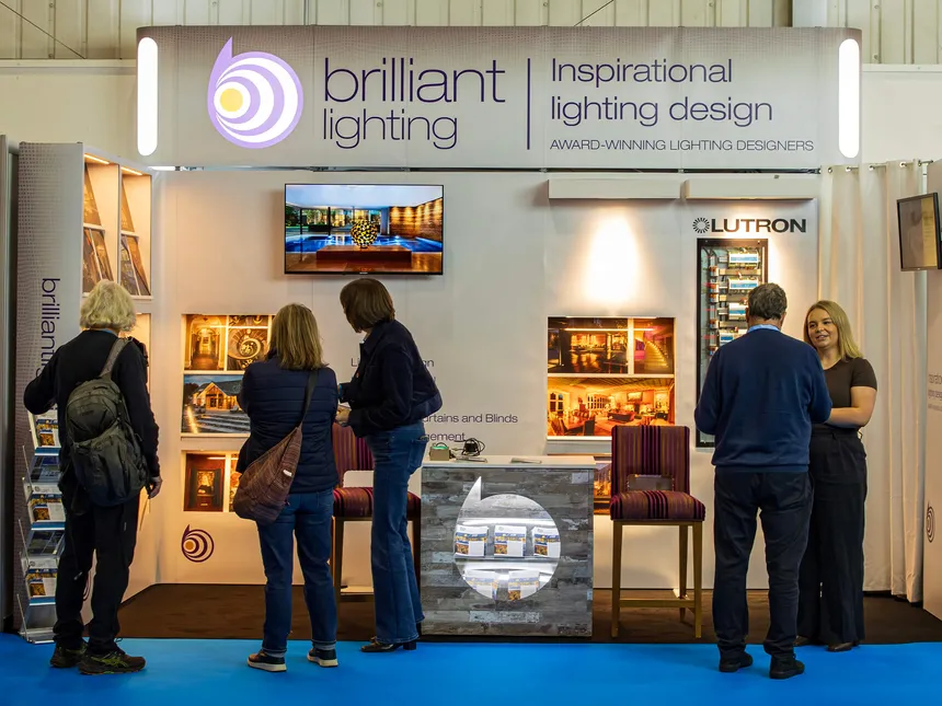 Mel and Francesca on the Brilliant Lighting stand at the Harrogate Homebuilding & Renovating Show in 2024