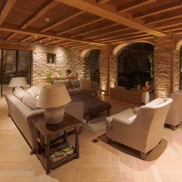 Cosy lounge setting in stone barn conversion