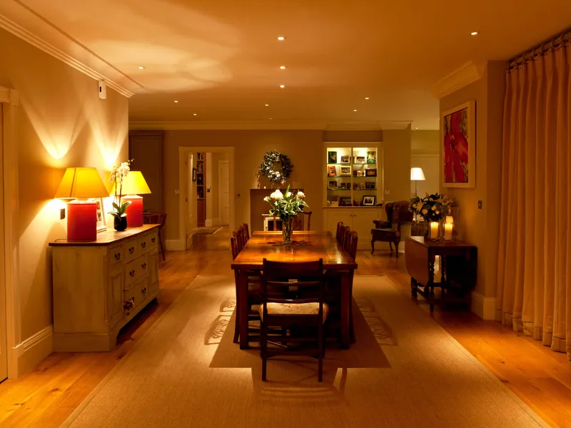 A dining room in a restored country house in the early evening