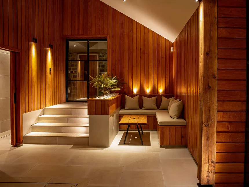 Subtle accent lighting for the seating area of a private swimming pool