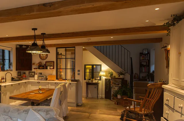 open plan kitchen with pendants over the dining table