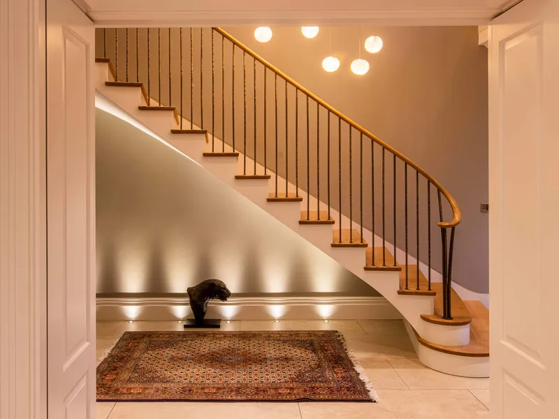 Uplights under the staircase and a decorative pendant