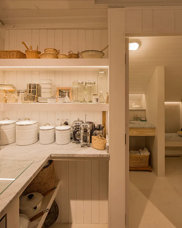 Scandi style kitchen and bathroom with linear LED lighting