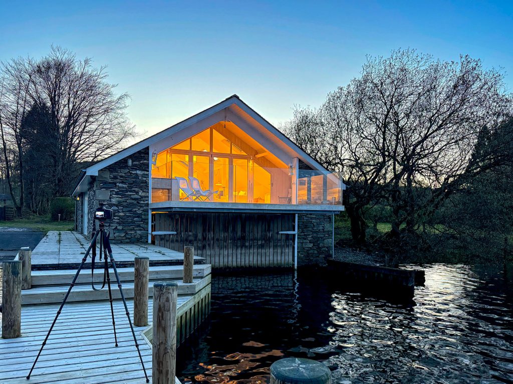 A DSLR on the jetty of a Lakeland boathouse